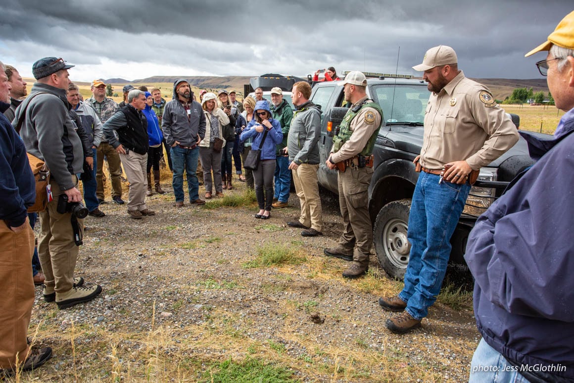 Media and outdoor industry professionals view landlocked public lands near Bozeman, Montana.