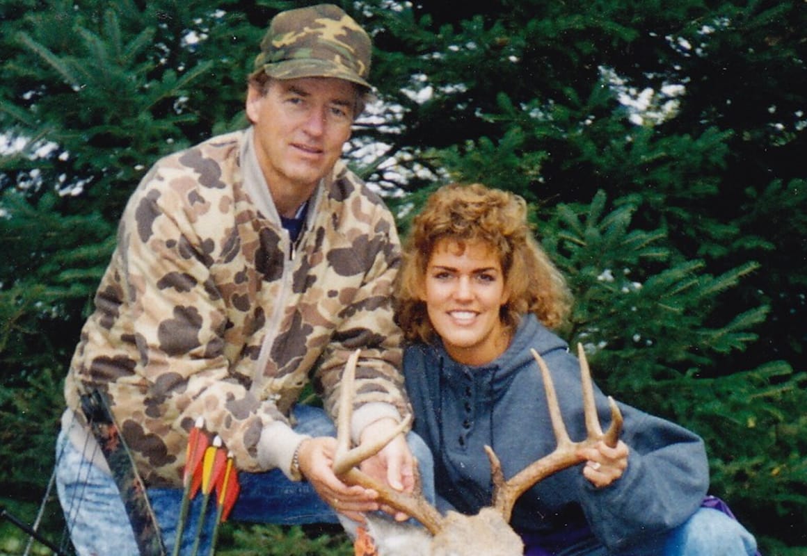 onX pro-staffer Jana Waller and her dad posing with freshly harvested 8 point whitetail buck.