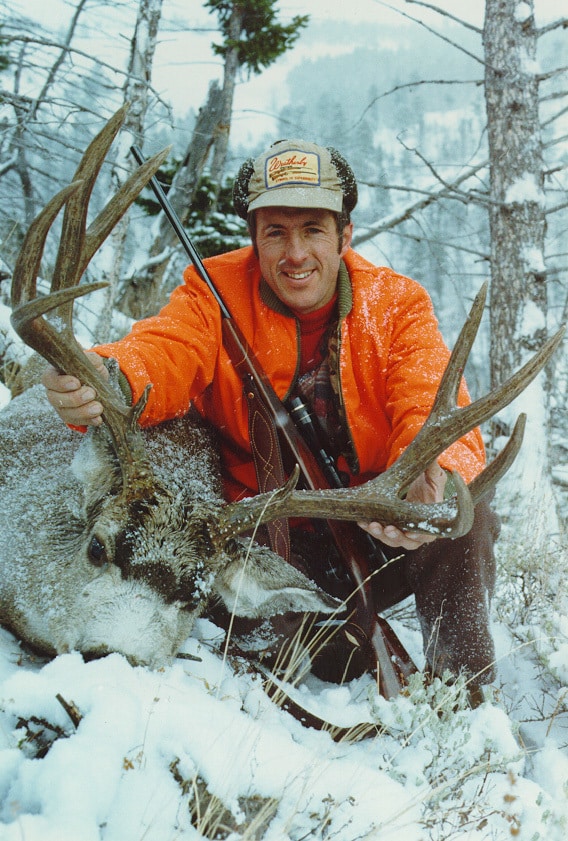 A younger George Bettas with a big Montana deer.