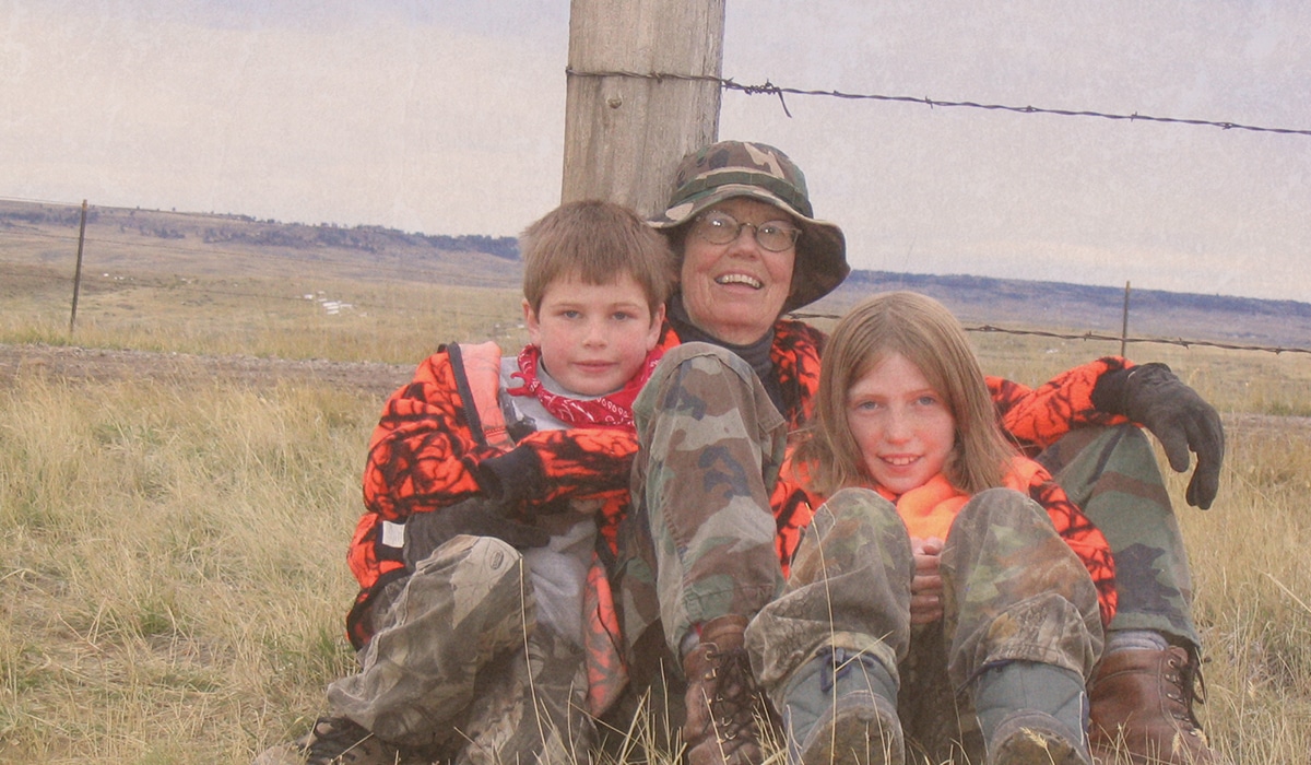 Generations of Montana hunters rest in the field during an antelope hunt.