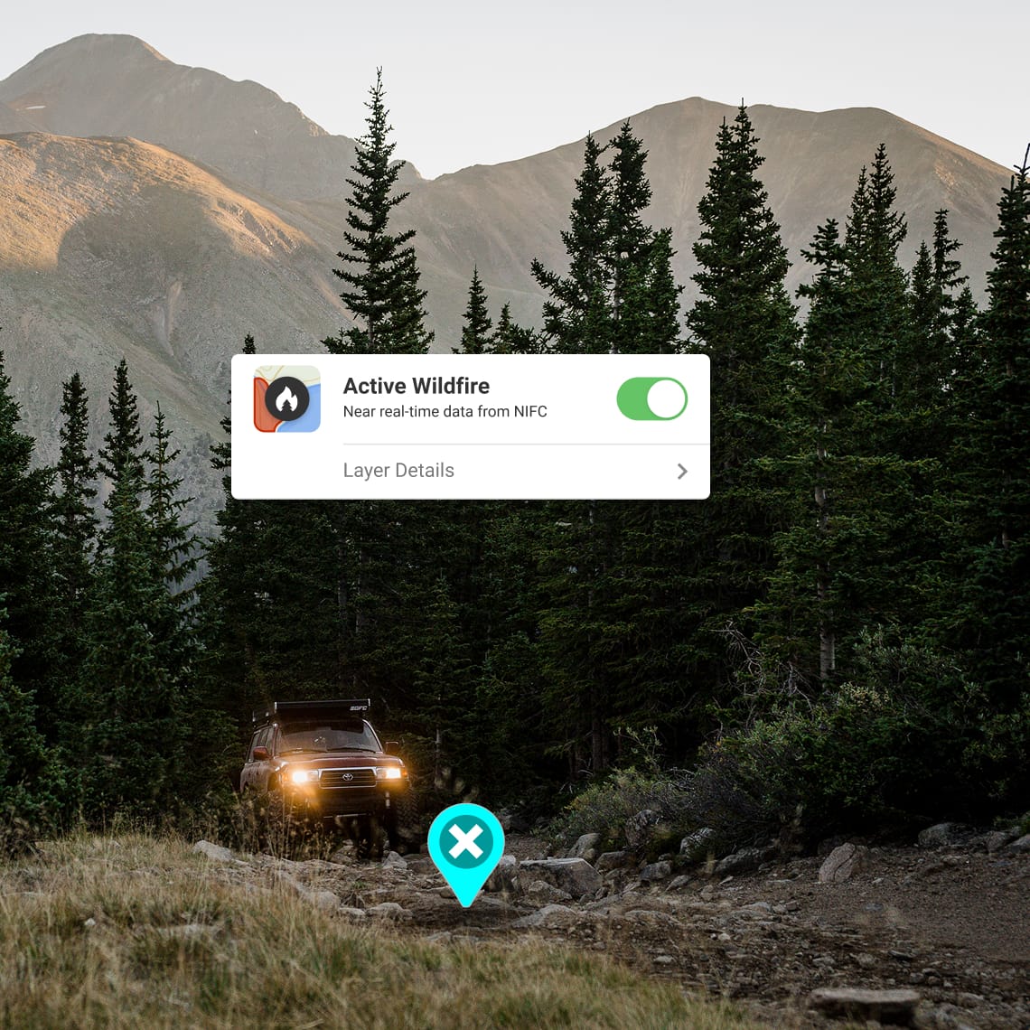 off-road vehicle driving into a mountian forest with the onX wild fire layer showing