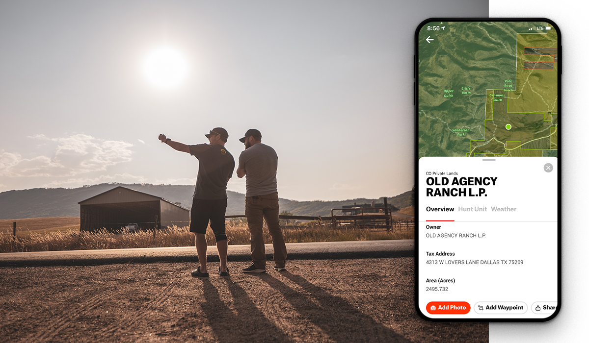 Two men stand on a gravel ranch road. A screenshot of the onX Hunt App showing private landownership information overlays the image.