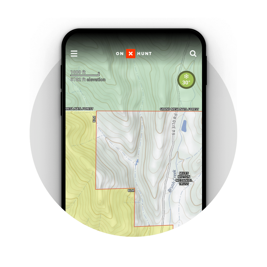 Mobile app showing public and private land boundaries overlayed on a topographic map.