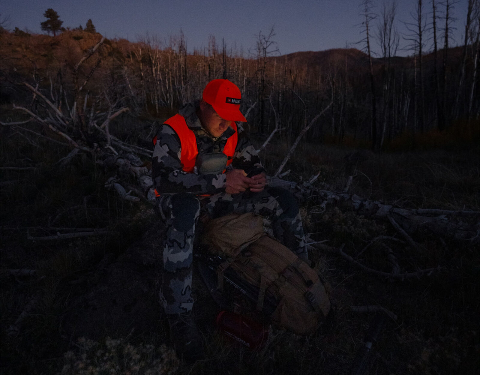 A hunter uses the onX Hunt App in the field. 