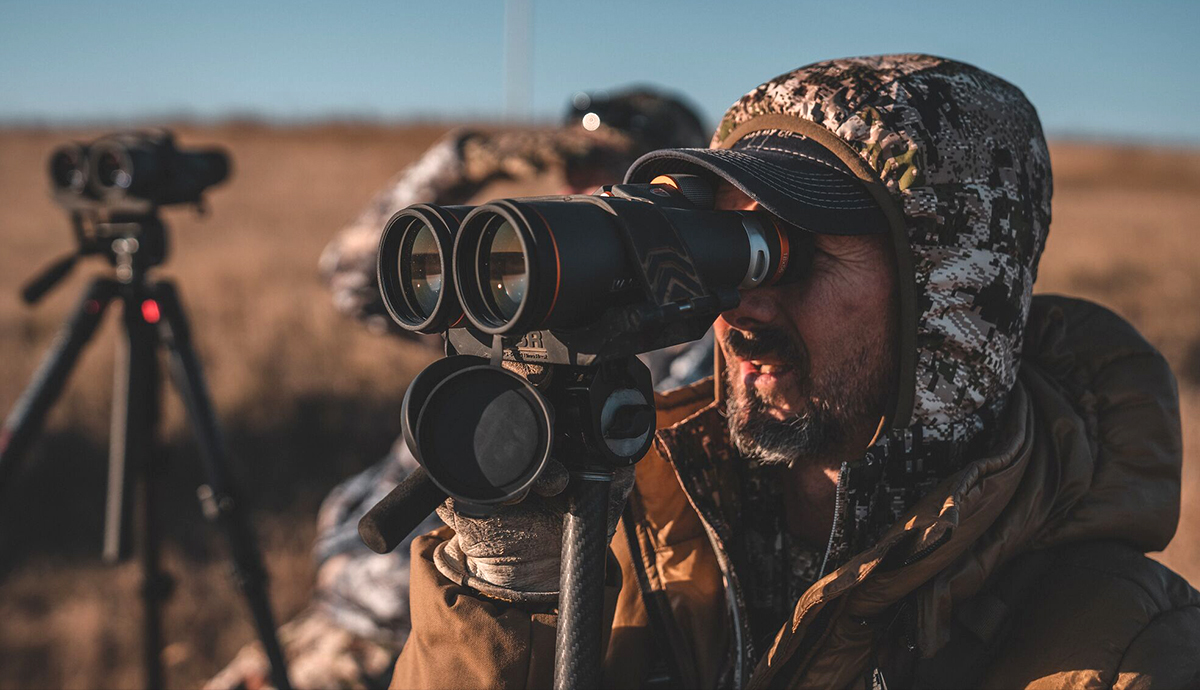 A hunter glassing for animals.
