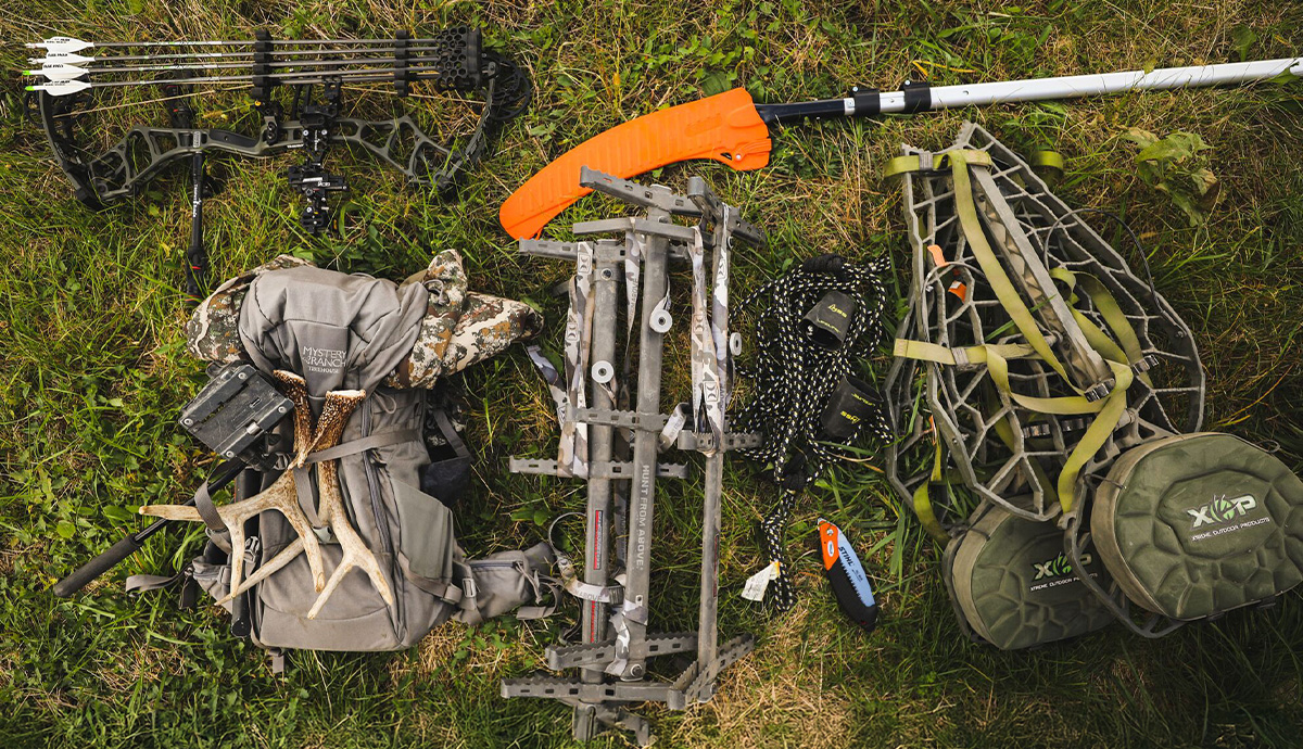 hunting gear laid out on the ground.