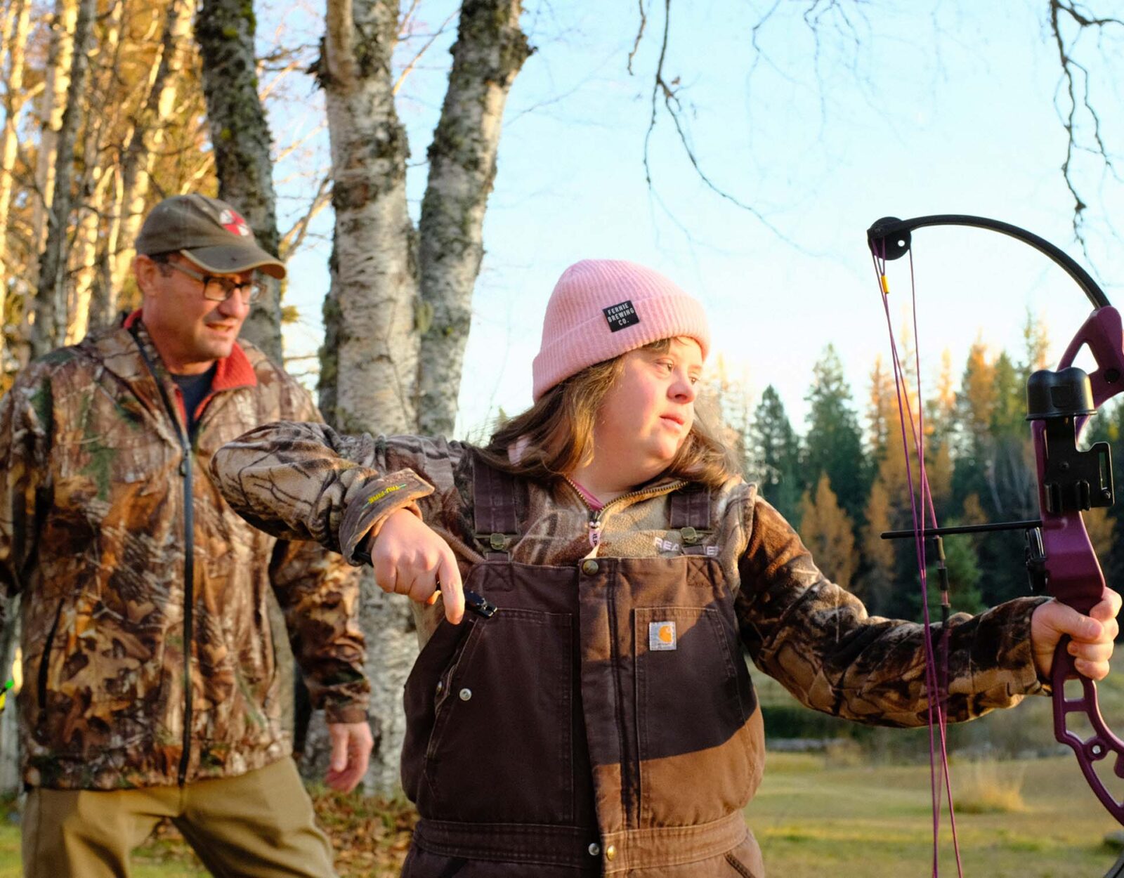 Father and daughter bow hunting 