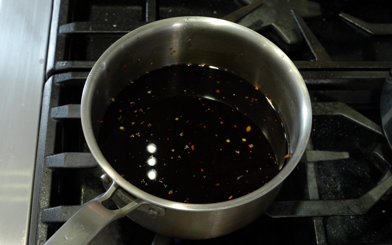 Deer heart glaze in a saute pan.