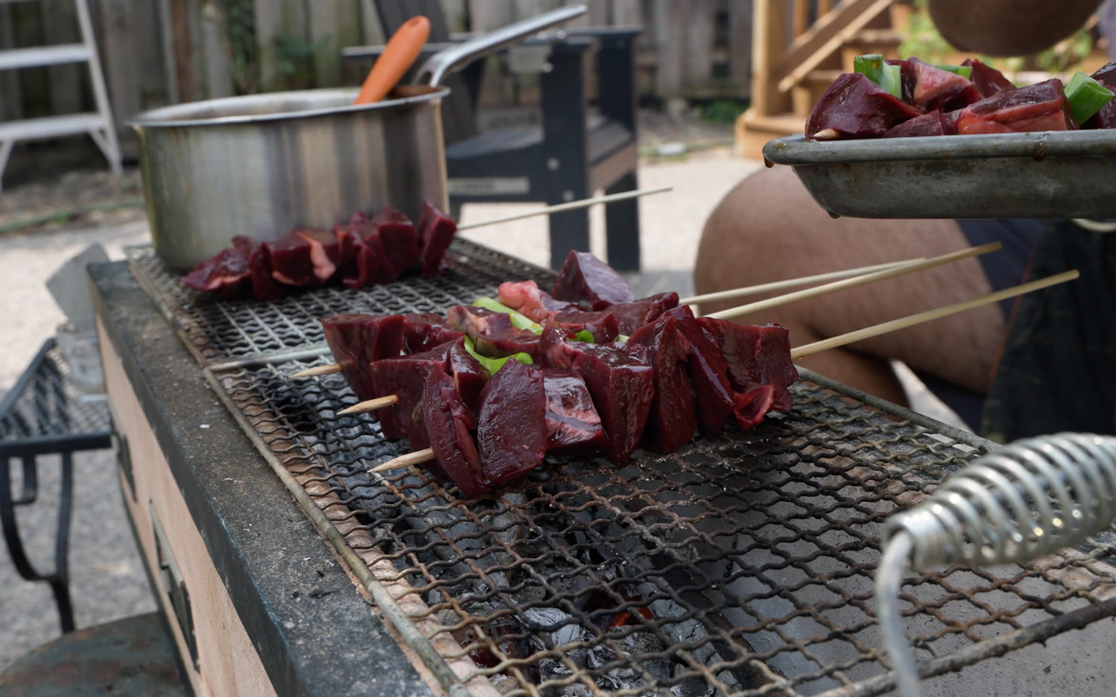 Deer heart skewers on the grill.