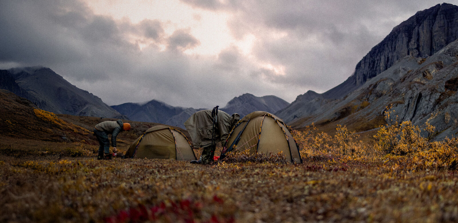 Hunters and tents in the mountains.