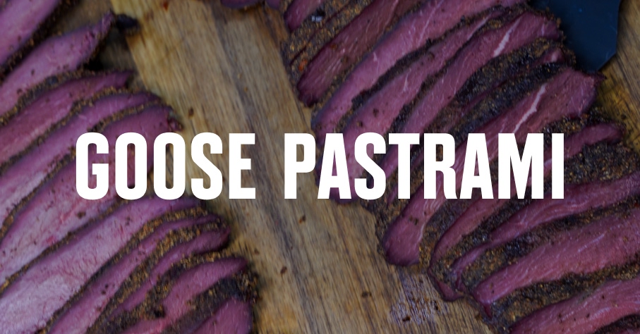 Goose pastrami on a carving board.