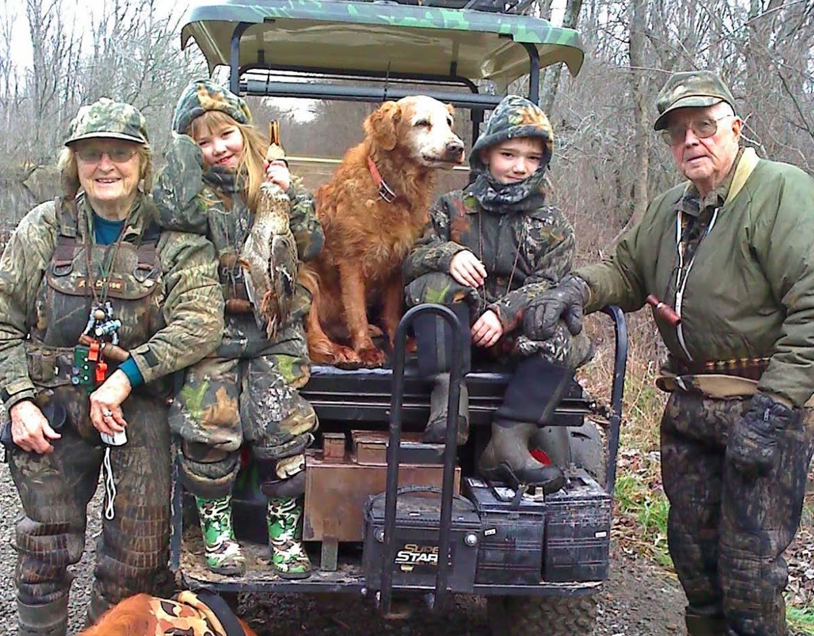 A group of people in camo.