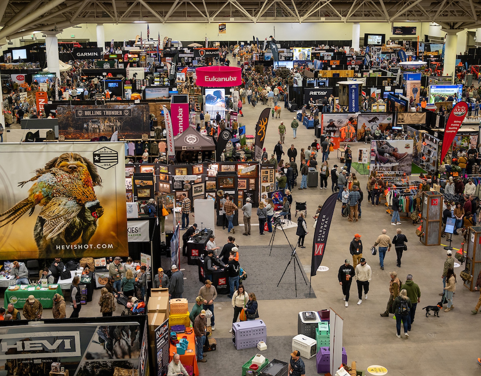 A crowded expo convention center room