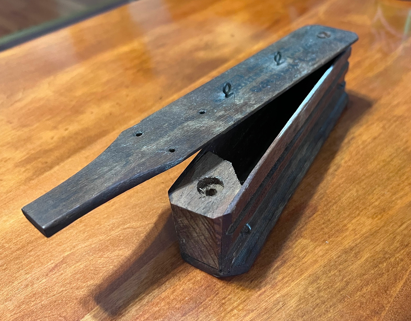 An antique turkey box call.