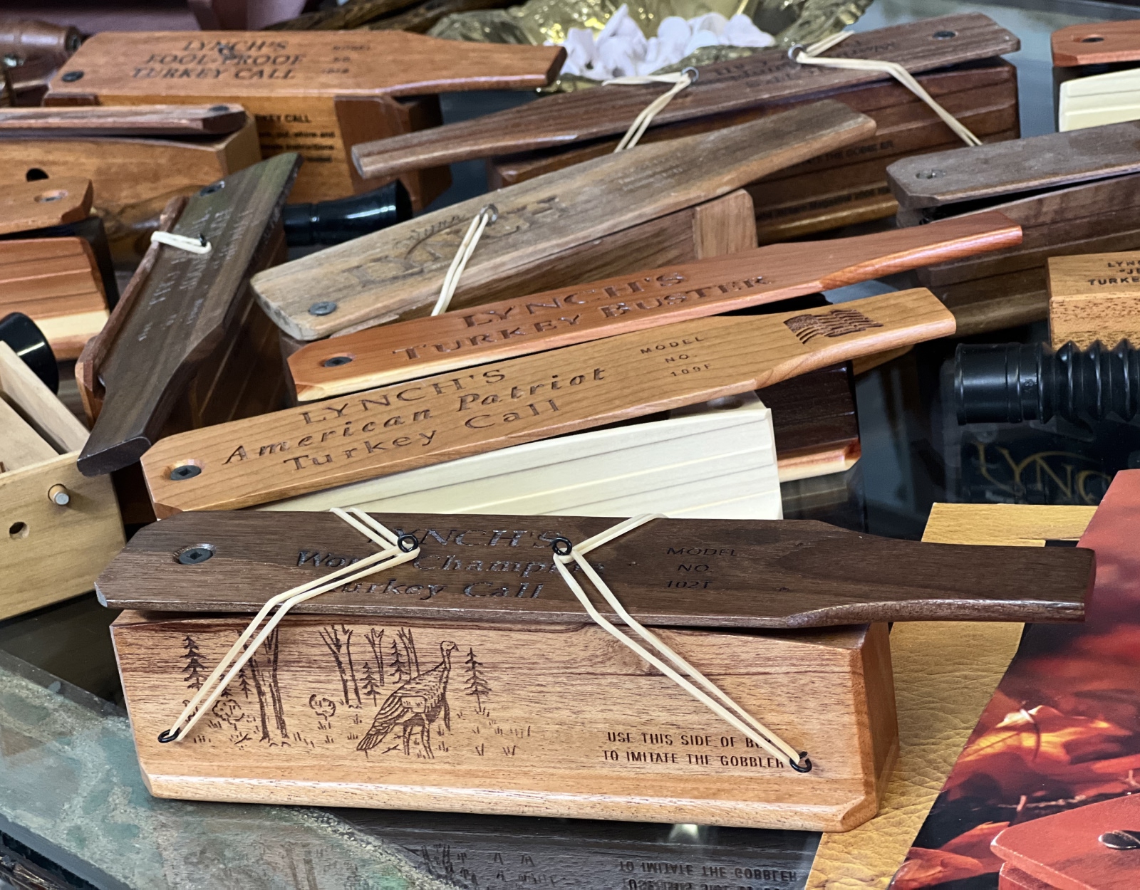 Numerous antique wooden box calls.