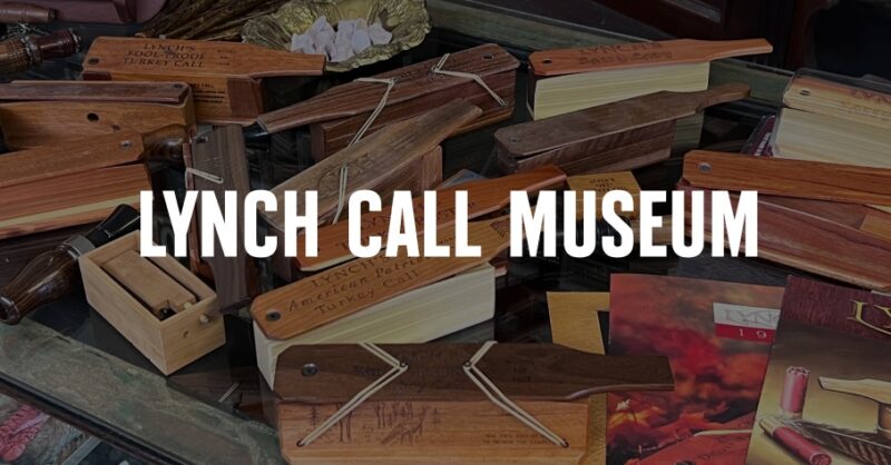 Turkey box calls with Lynch Call Museum written over in white text.