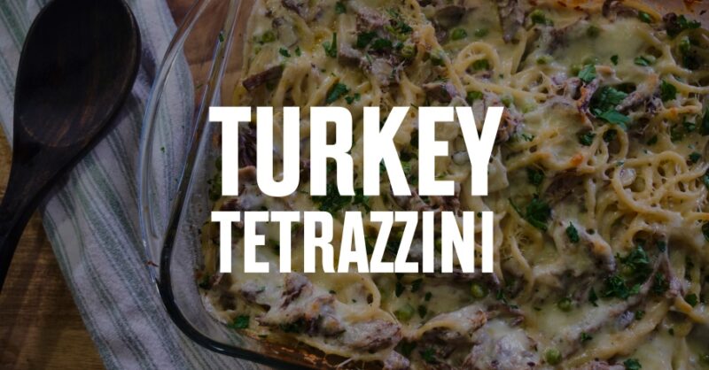 A pasta casserole sits on a table with Turkey Tetrazzini overlaid in white font.