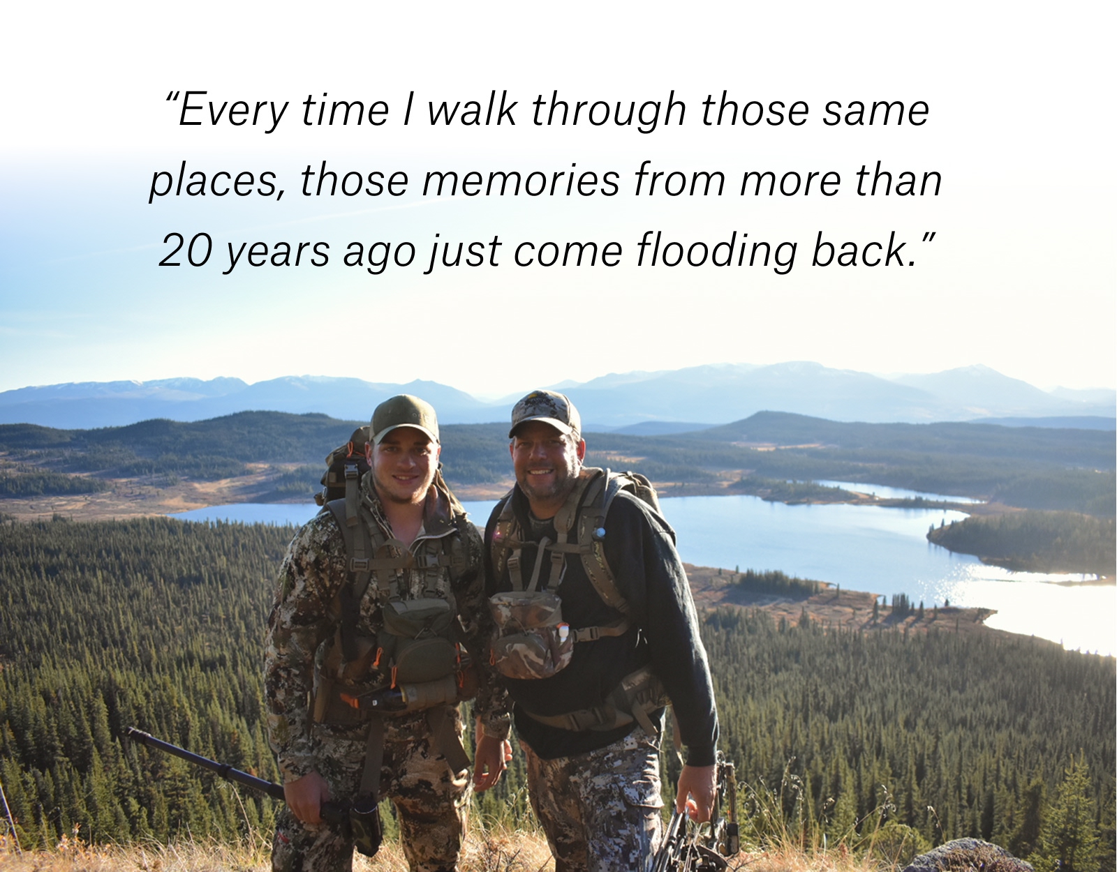 A father and son pose for a picture on a hunt.
