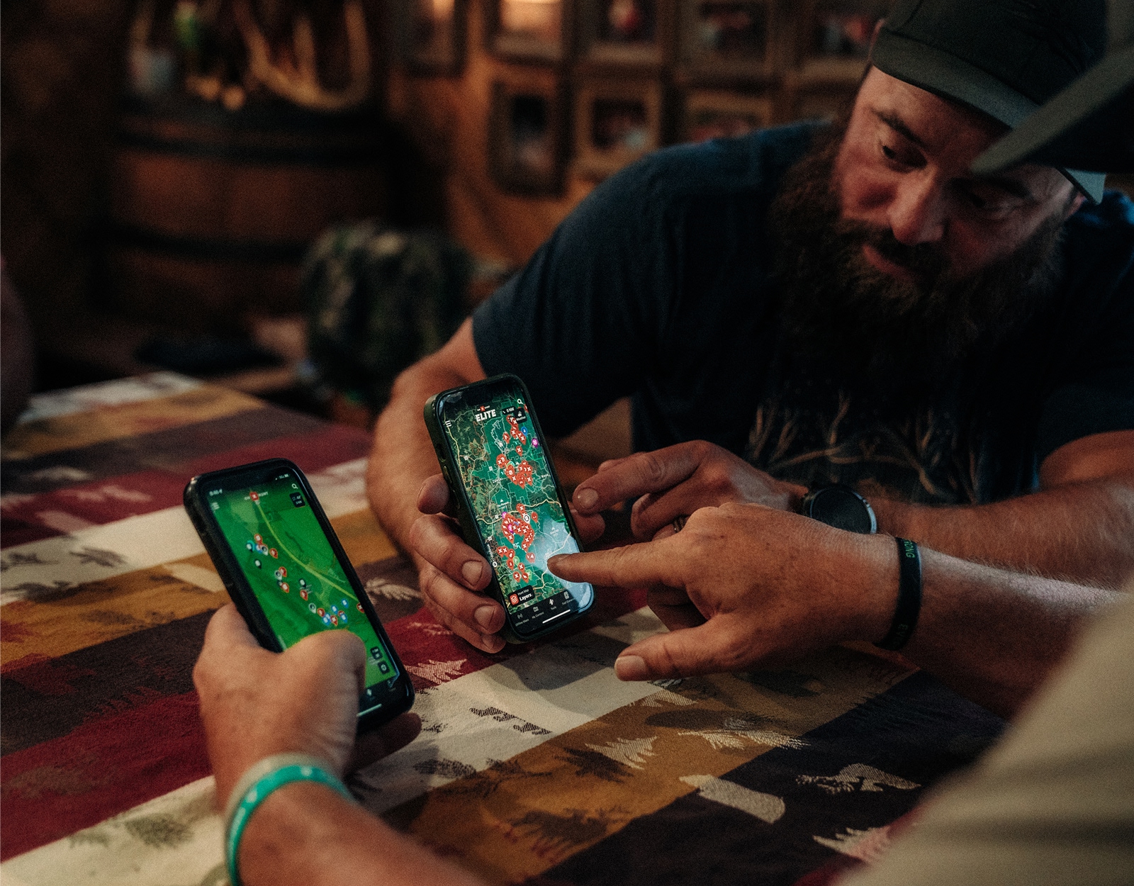 People using the onX Hunt app to e-scout whitetail deer.