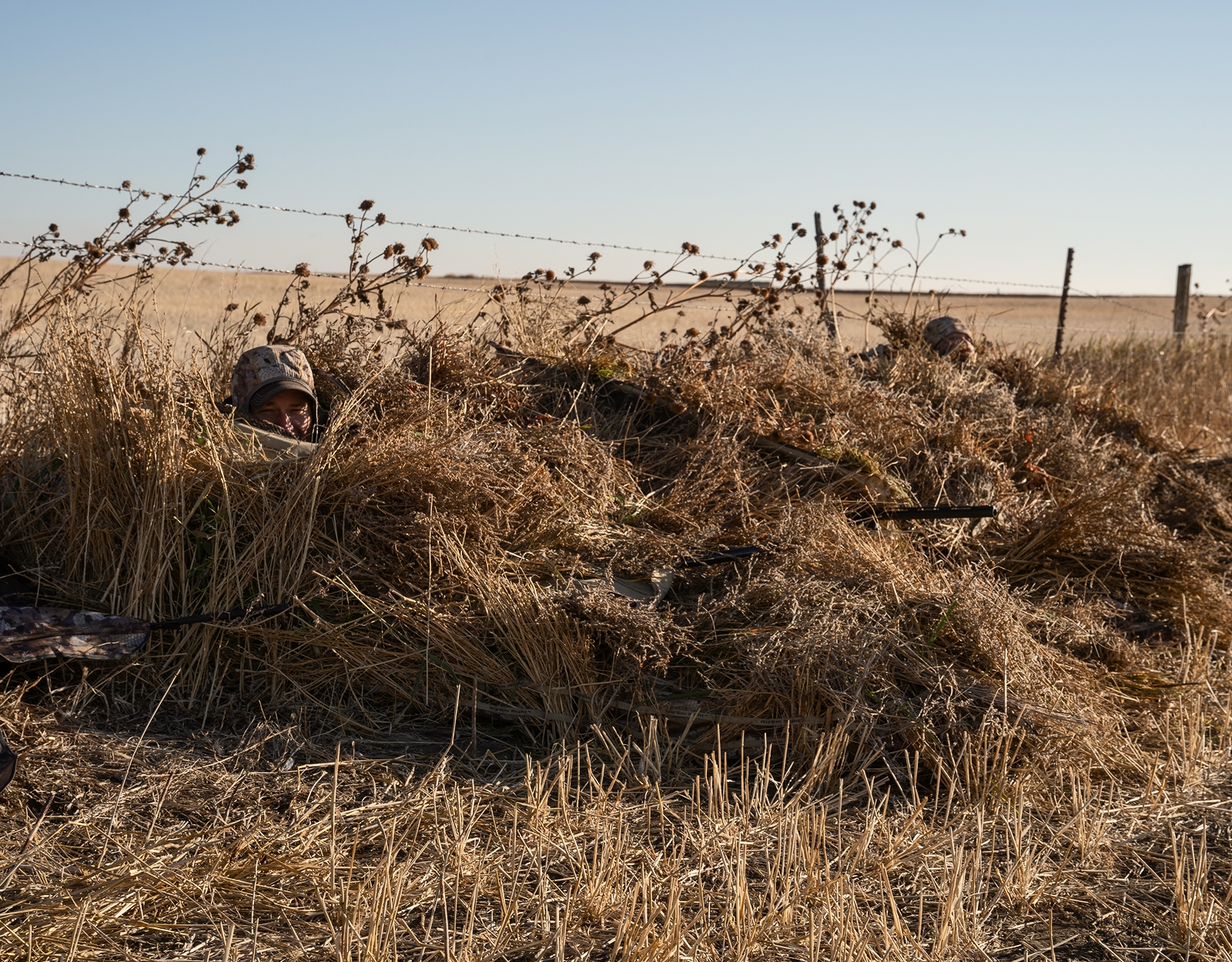 A hunter in a layout blind