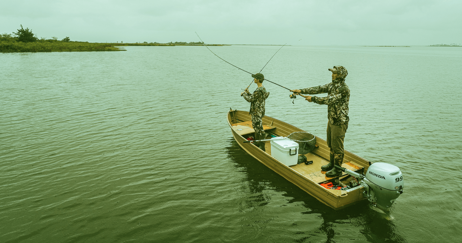 Fisherman on a boat in a lake