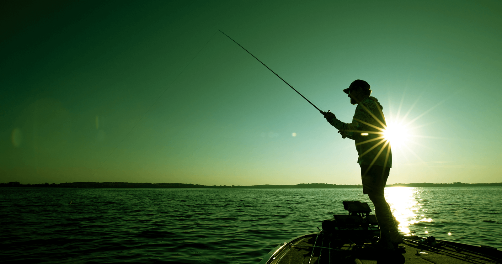 Angler fishing in the morning with the onX fishing app