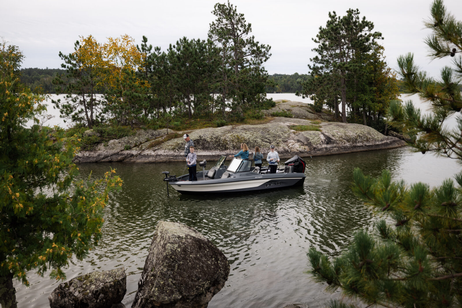 a group of anglers fishing from a boat