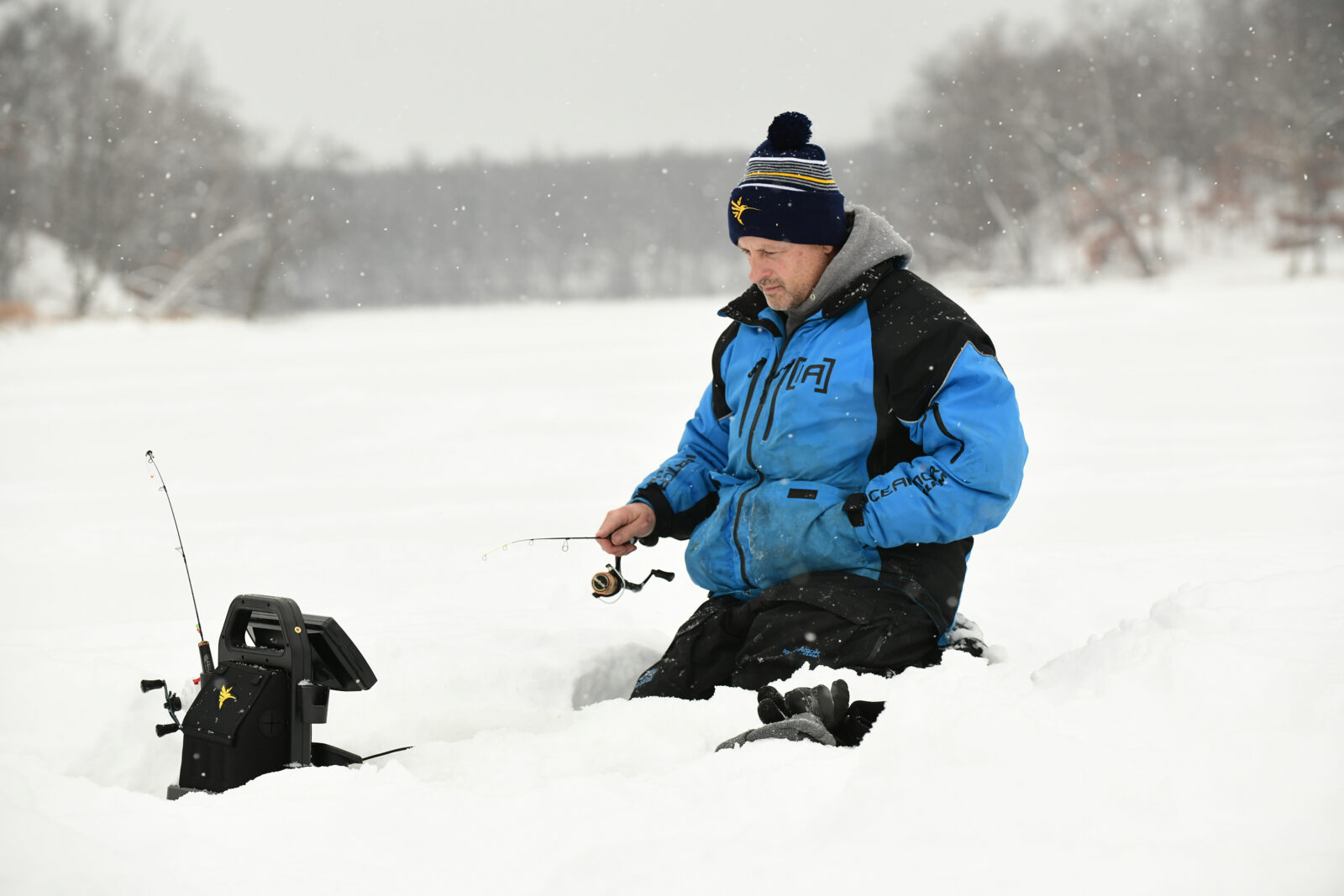 Ice fisherman on a frozen lake