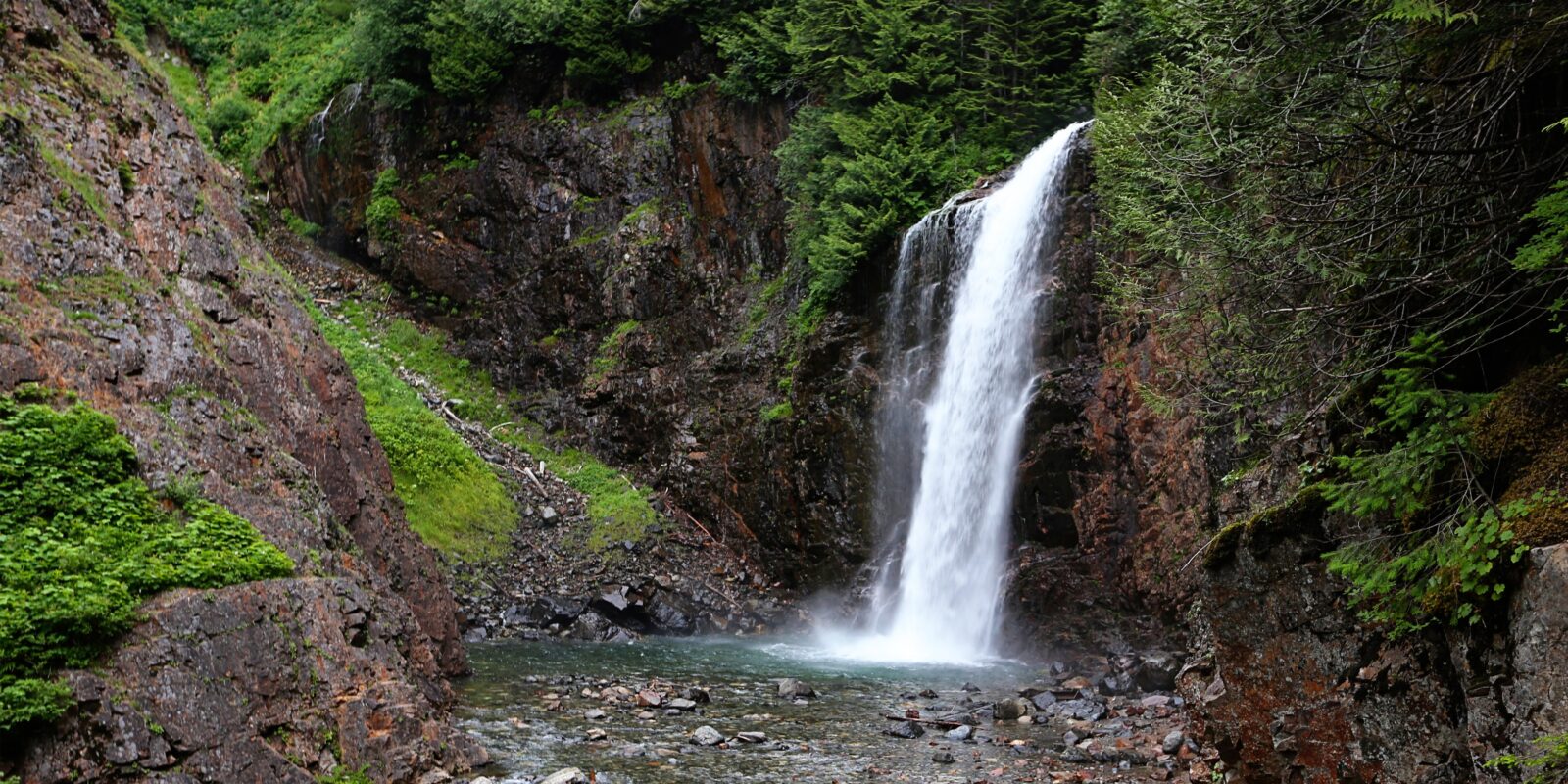 a waterfall at Franklin Falls hiking trail