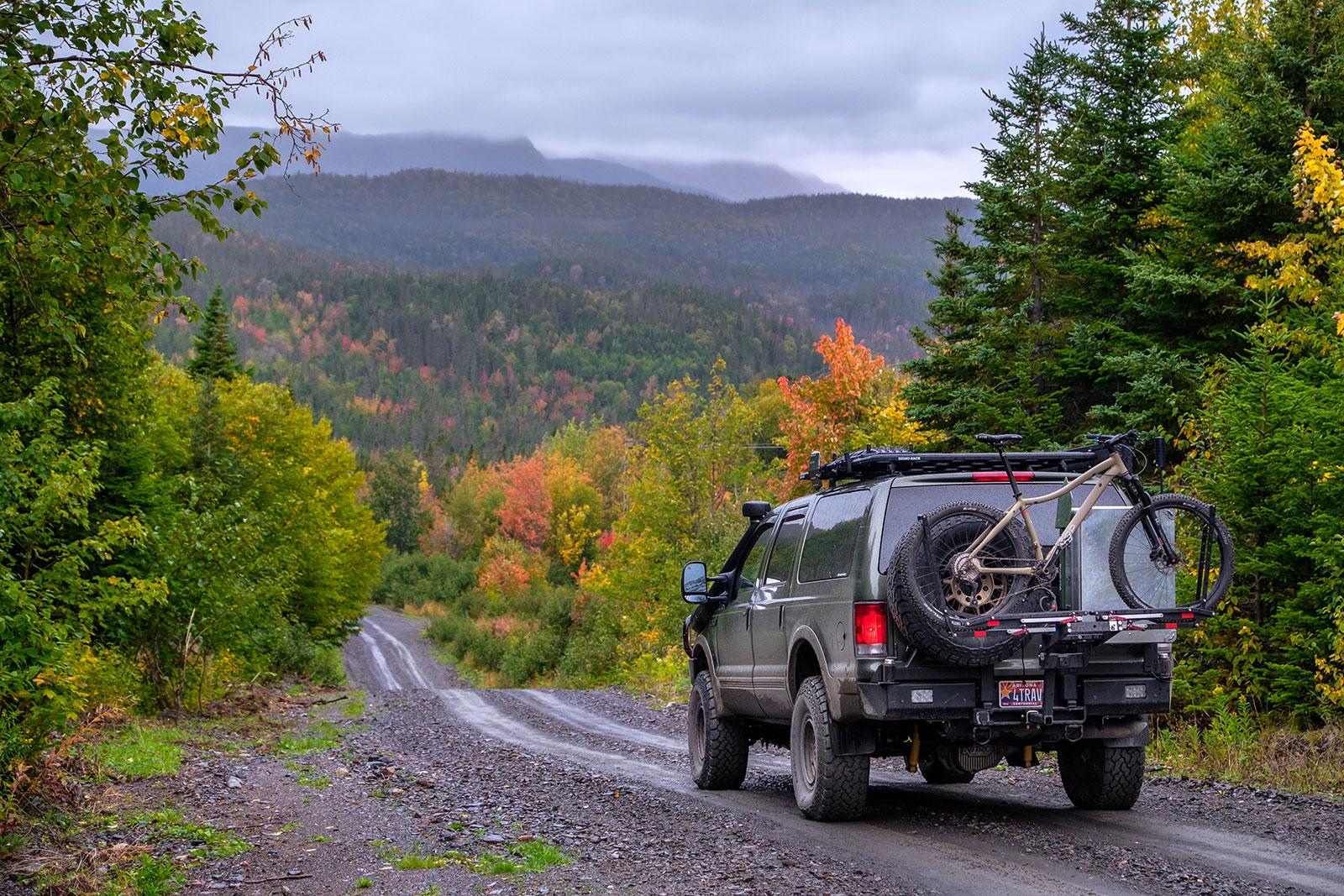 4WD off road vehicle on a trail in the mountains. Photo Credit: Chris Cordes