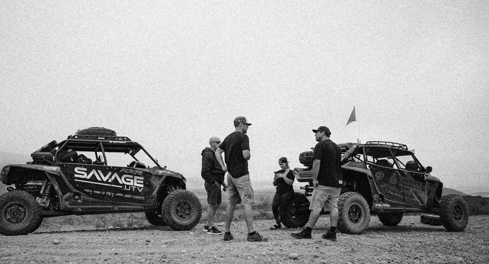onX Offroad ambassadors standing around some off-road vehicles
