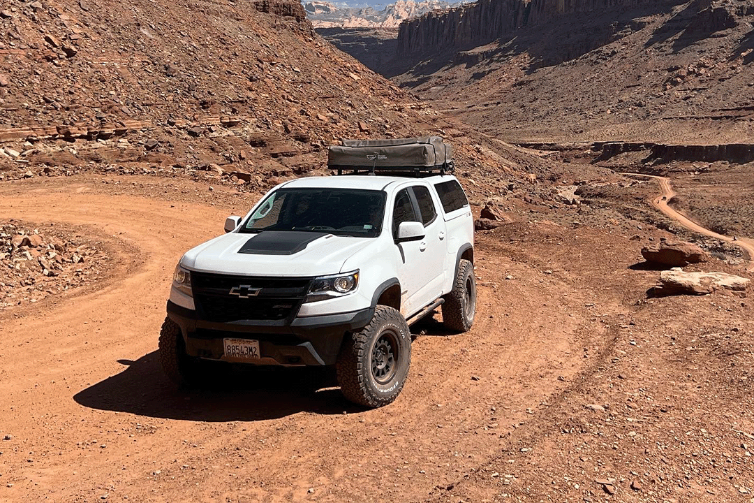 a white Chevy off-road vehicle