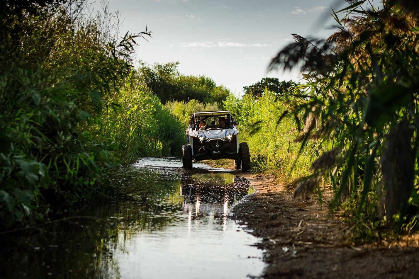 UTV on a flooded trail